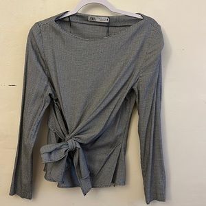 Zara Tie atop